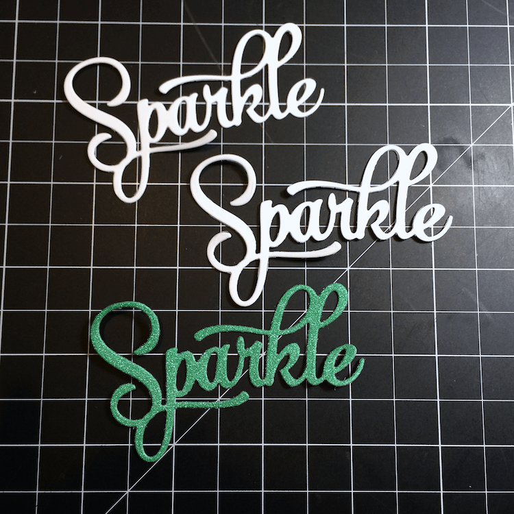 Embossing paste and glitter - because everything is better with glitter. Create a faux chipboard sentiment with multiple die cuts!