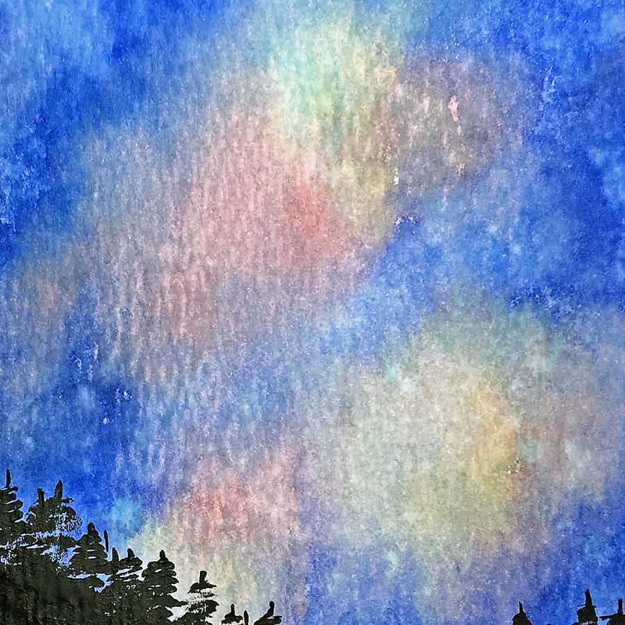 Blending distress ink and misting with water is a great way to create beautiful night sky effects.