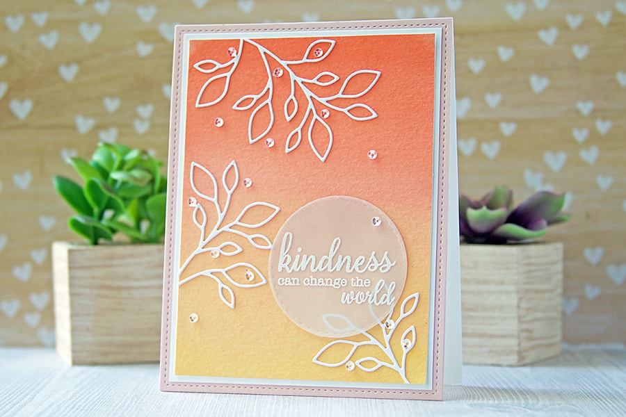 White die cuts on a watercolor painted background. Beautiful ombré effect!