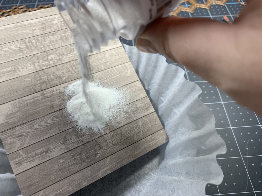 Pouring the embossing powder, getting ready to heat emboss!